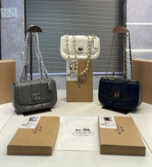 COACHH Tabby Pillow Mini Premium Quality with OG Box (Scentiq)AV088